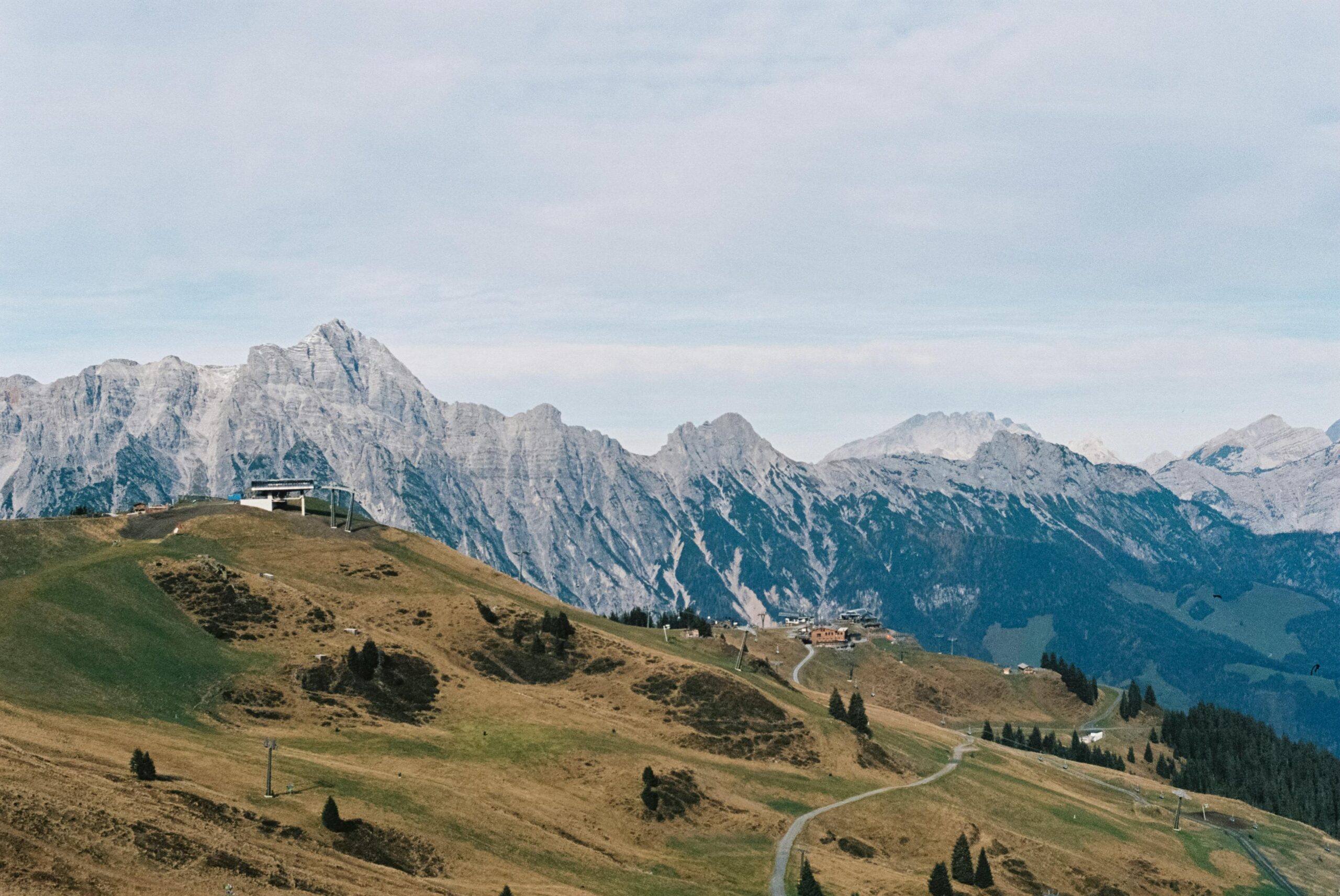 Beautiful view of Leogang's mountain peaks and valleys in Salzburg, Austria during the day.